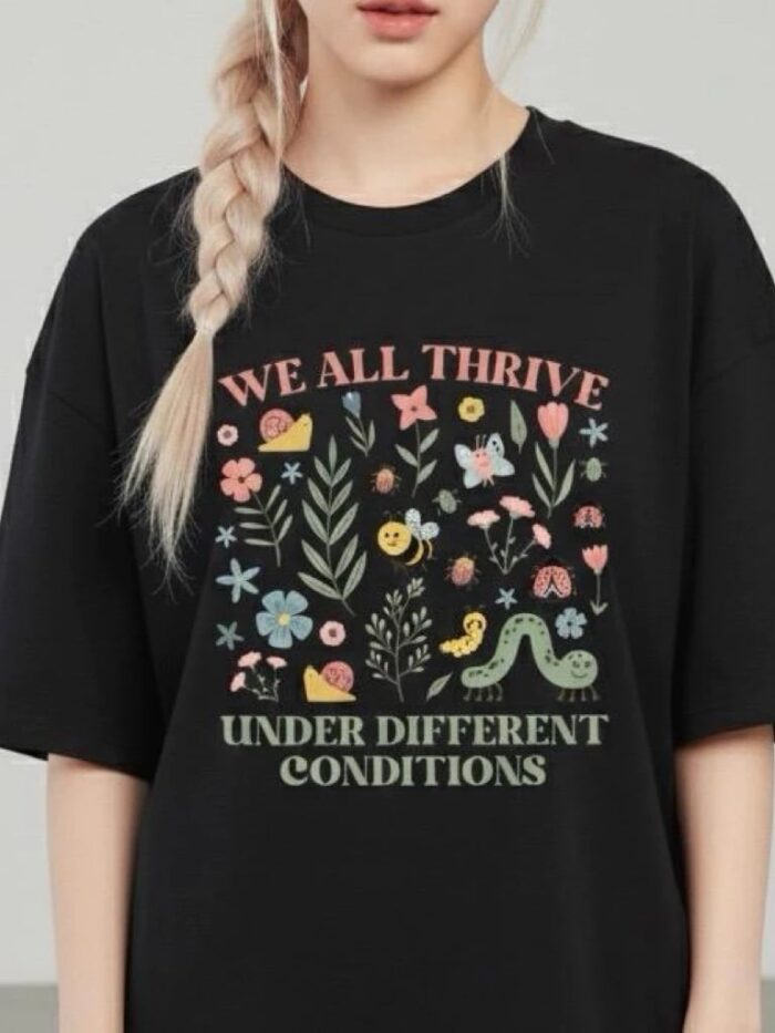 เสื้อยืด We all thrive under different conditions ขาวดำ คอกลม มีไซส์ S-3XL
